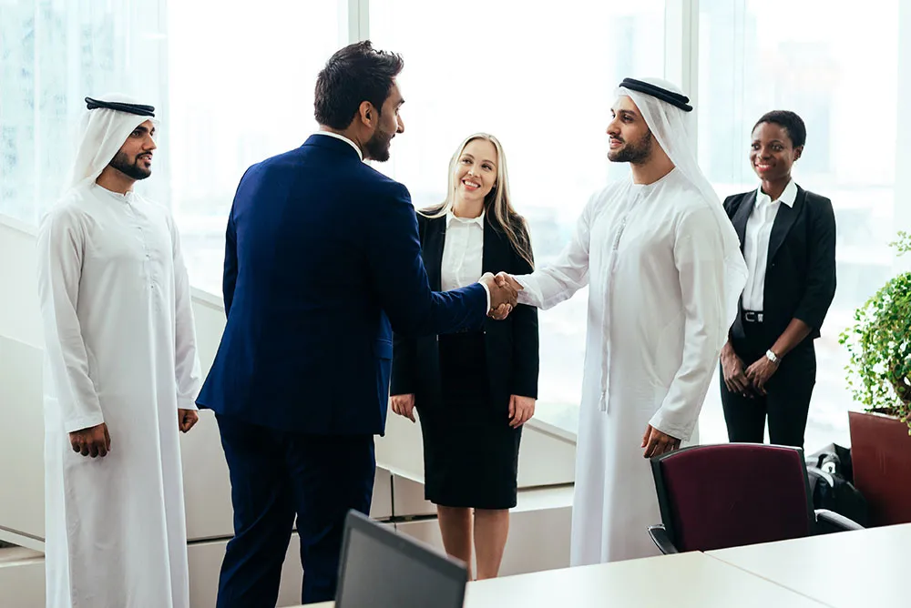 Financial strategists planning long-term goals during a business valuation session in Dubai