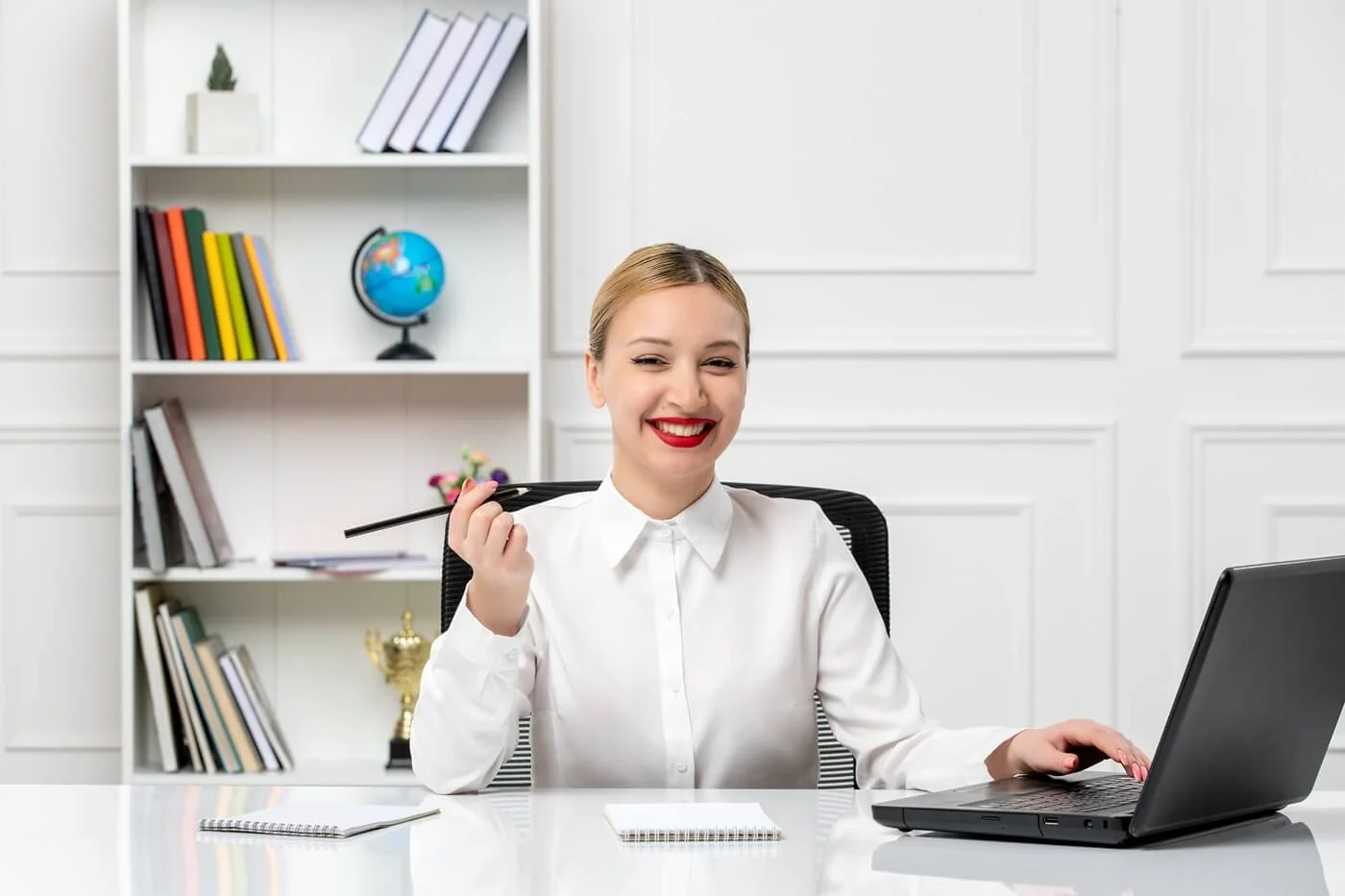 customer-service-cute-girl-white-shirt-with-red-lipstick-laptop-smiling-holding-pen